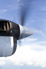 Naklejka na ściany i meble Close up of a turboprop engine in flight