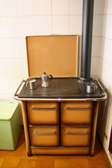 antique cast iron stove is a stove in a house