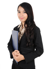 businesswoman carrying a folder