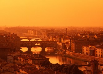 Fototapeta na wymiar River Arno and skyline at sunset, Florence © Arena Photo UK