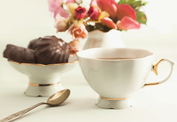 Cup of tea with chocolate