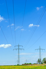 high-voltage line in yellow field