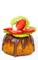 fruit cake with strawberries and kiwi fruit isolated on white