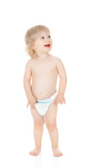 cute baby girl in a diaper looks up isolated on white