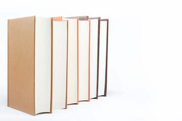 A stack of books on a white background.
