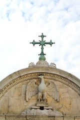 Pediment with St John the Evangelist. Venice, Italy