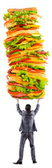 Man and giant sandwich on white
