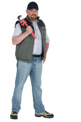Worker with an adjustable pipe wrench