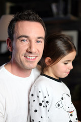 Fototapeta premium Father and daughter sat at home