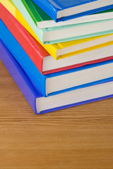 pile of books at wood background
