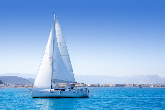 Fototapeta sailboat sailing in Mediterranean sea in Denia