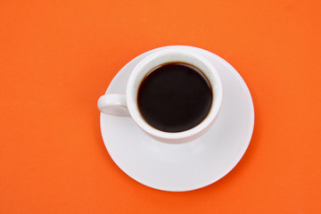 Coffee cup isolated on orange background