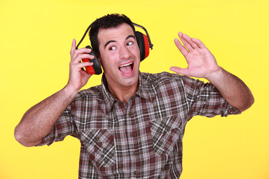 Man wearing earmuffs