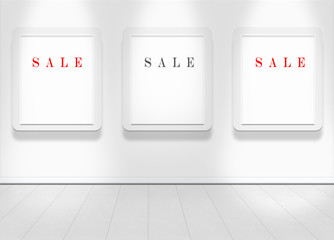 Empty white wall with spot lights and clean floor with sale text