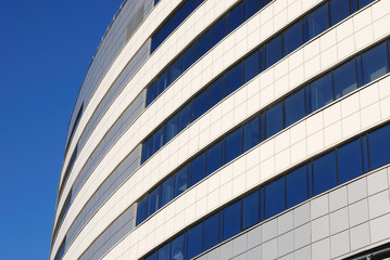 Kind on a modern building against the sky