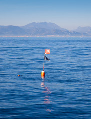 Longliner and trammel net buoy with flag pole