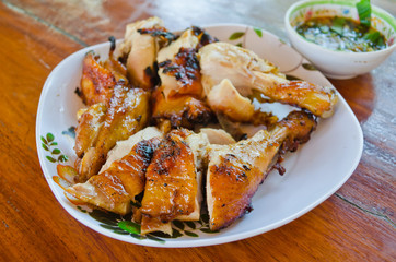 Grilled chicken on table