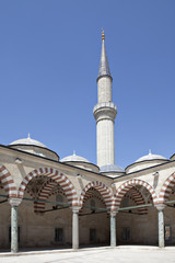 Fototapeta na wymiar One of the minarets of Uc Serefeli Mosque, Edirne, Turkey