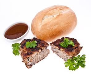 Halved burger with parsley isolated