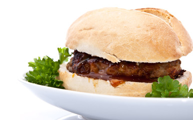 Burger on a roll isolated on white