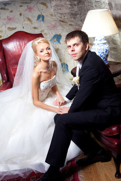 beautiful groom and bride in interior