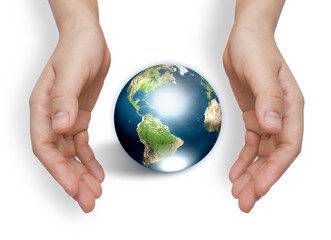 Two hands with earth  (Elements of this image furnished by NASA)