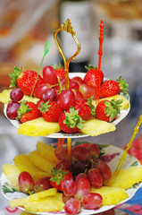 Fruits on three tier vase