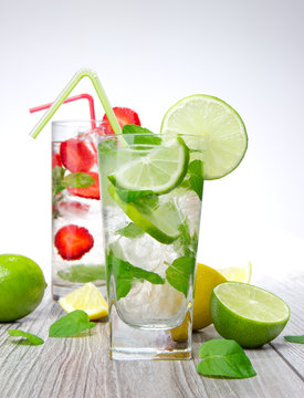 Mojito drink on wooden background