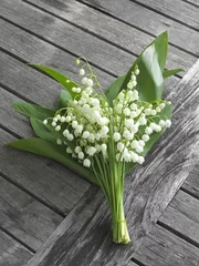 Peel and stick wall murals Lily of the valley lily of the valley  on old wooden table