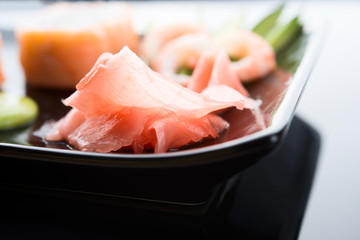 sushi with ginger, avocado and shrimps
