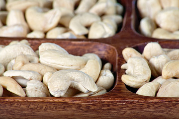 Cashew nuts in a wooden bowl