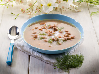 bean soup over wooden table