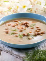 bean soup over wooden table