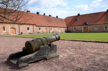 Old cannon in Swedish castle porch