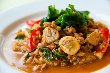 delicious fried pork, onion, chili, vegetables and green herbs