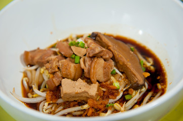Asian cuisine, rice noodles in white bowl
