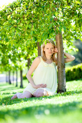 Pregnant female in park
