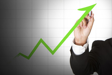 businessman hand touch graph