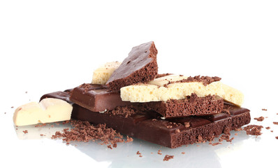 Slices of milk and white chocolate bar with chocolate shavings