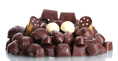Many different chocolate candy isolated on white