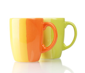 Two color cups isolated on white