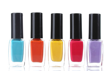 Obraz premium Group of bright nail polishes isolated on white