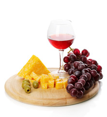 Wine in wineglass and cheese isolated on white