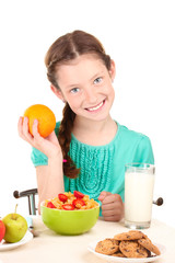 little beautiful girl have a breakfast on white background