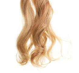 Naklejka premium Curly blond hair isolated on white