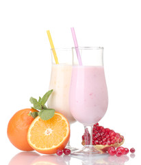 Milk shakes with fruits isolated on white