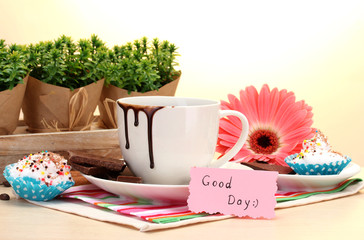 dirty cup of coffee and gerbera  beans, cinnamon sticks