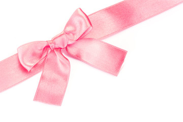 beautiful pink satin bow and ribbon isolated on white.