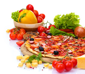 delicious pizza, vegetables and salami isolated on white.