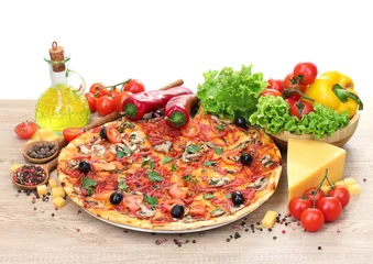 Fotobehang delicious pizza and vegetables on wooden table © Africa Studio